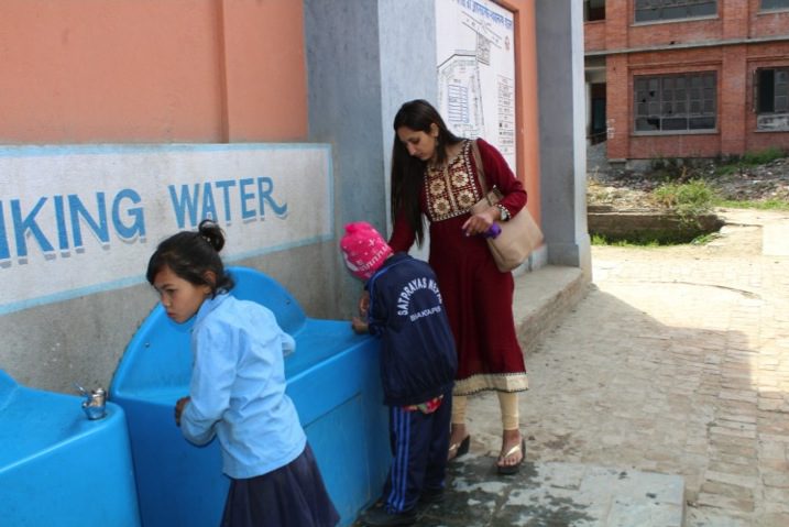Assist the needy children to move around the school (like here drinking water).